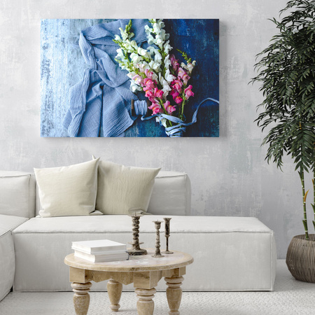 Leinwandgemälde Tiere Löwenmäulchen auf blauem Stoff 40x30 cm